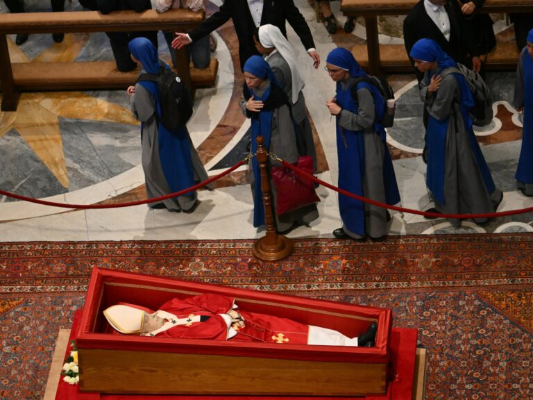Thousands more queue to see Pope Francis on second day of lying in state