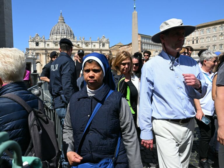 In Vatican City, mourners and the curious gather after Pope Francis dies