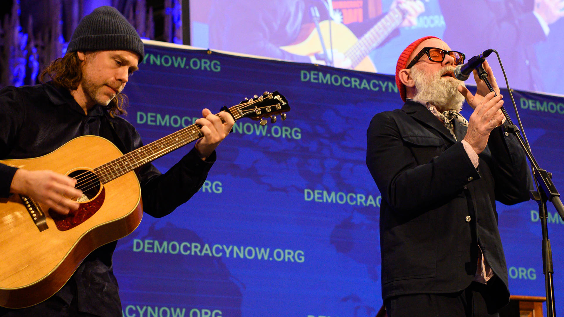 Michael Stipe & Aaron Dessner Perform “No Time for Love Like Now” at Democracy Now! Celebration