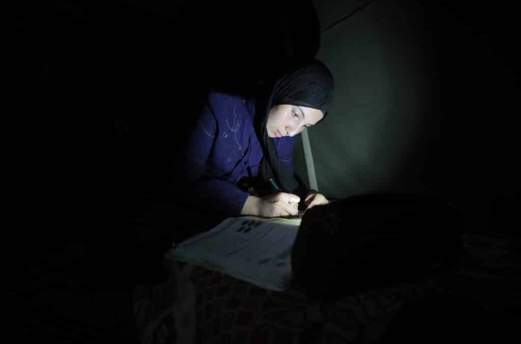 Studying for high school finals in Gaza without electricity, adequate food, or a home