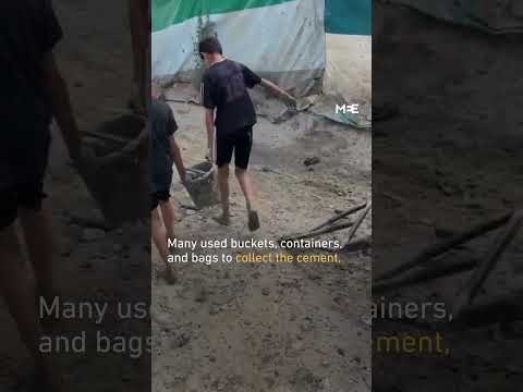 Palestinians rush to collect cement after Israel uses it to seal off tunnel